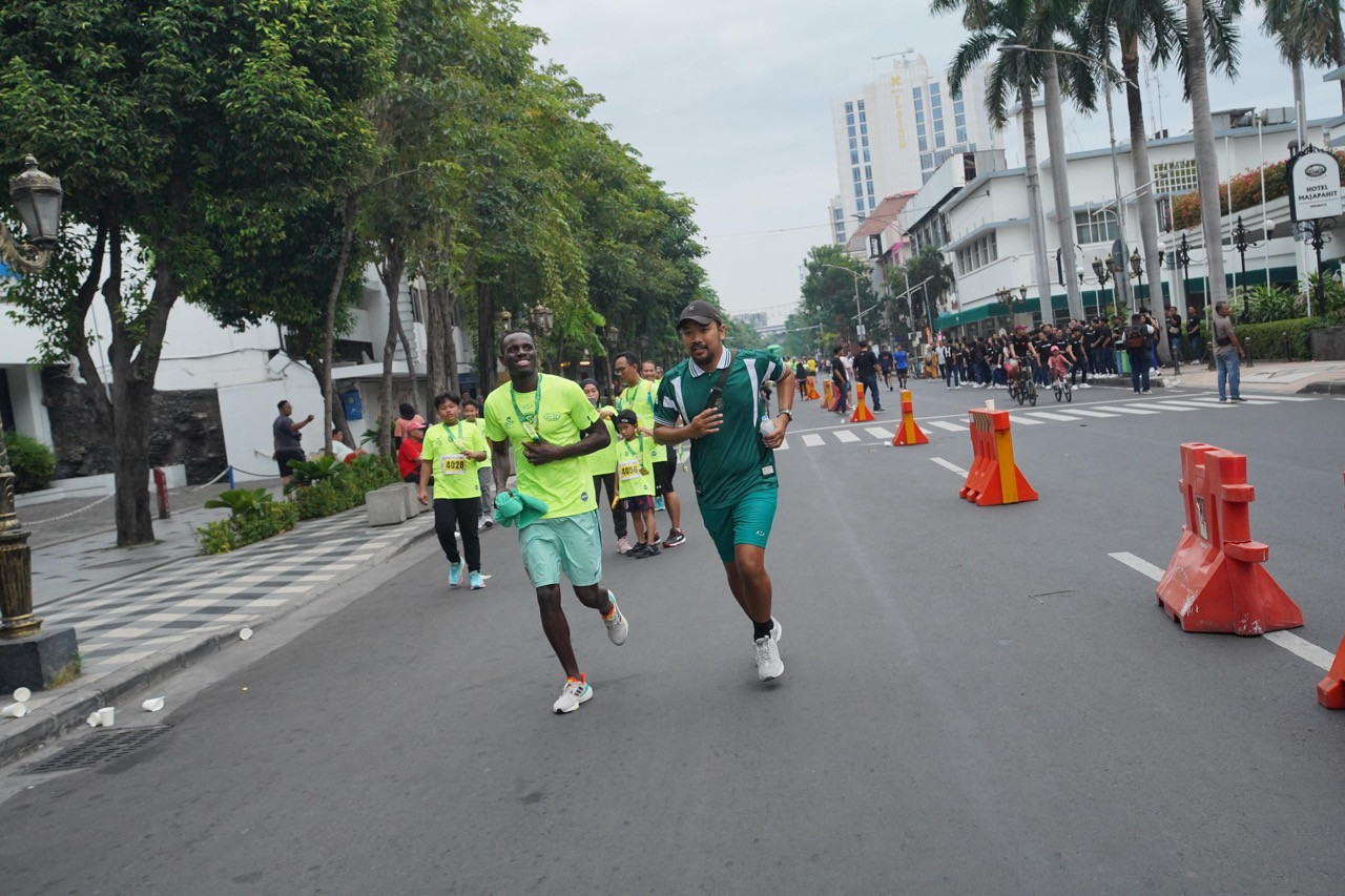 Flavio Silva saat ikut lari kategori Family Run.